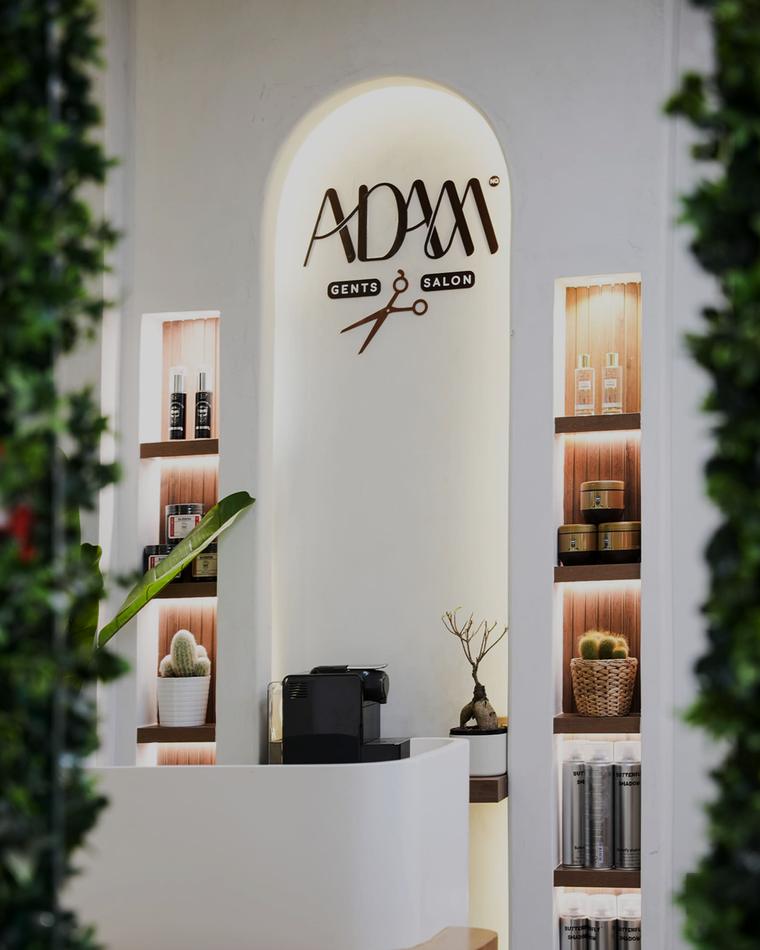The Adam NQ logo on the arched wall